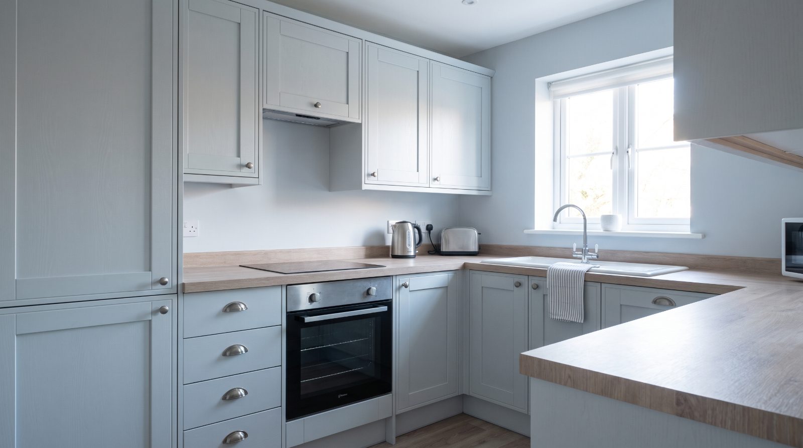 A clean, viewing-ready kitchen in a rental property